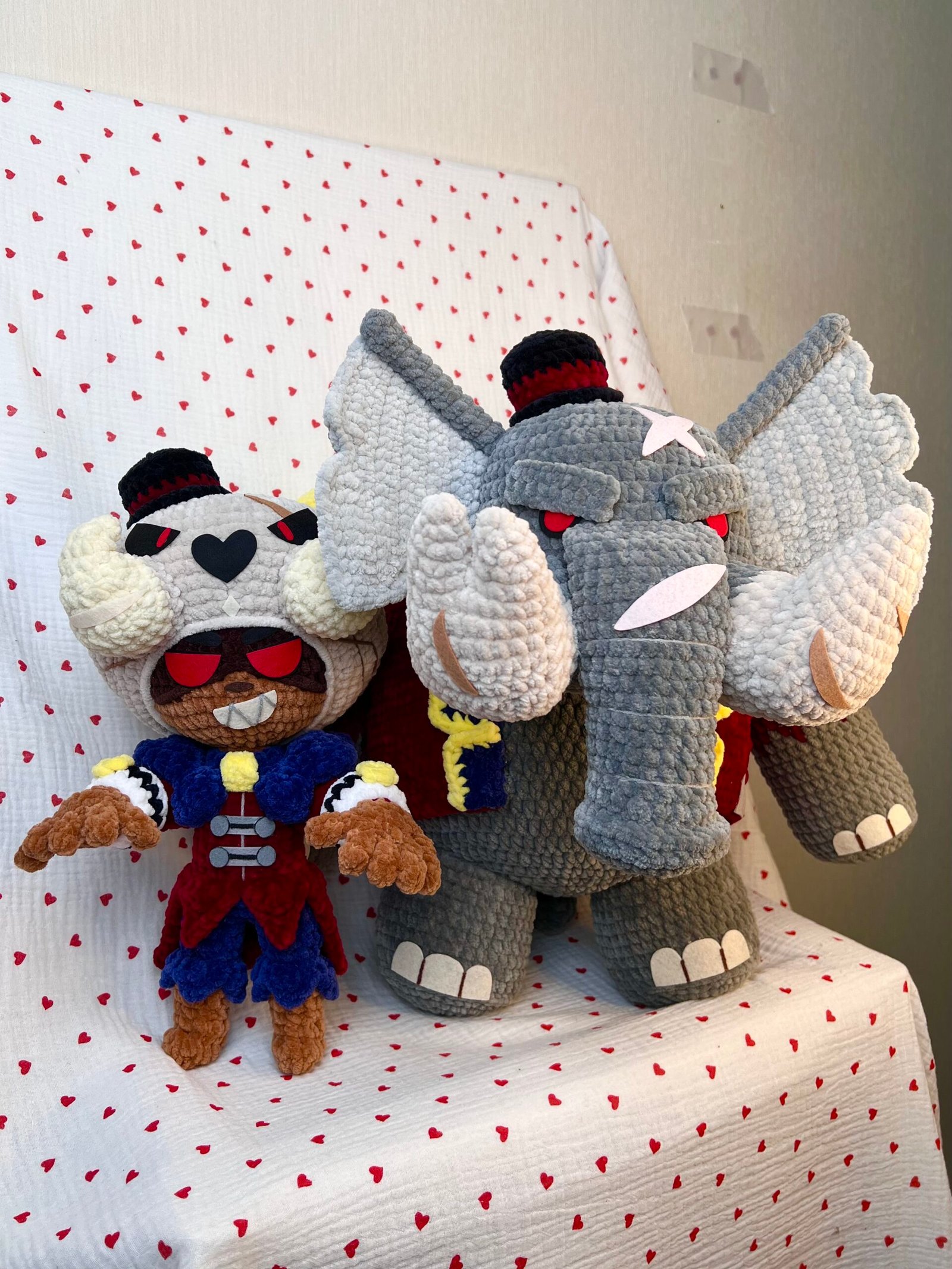 Handmade circus duo amigurumi — horned warrior and armored elephant