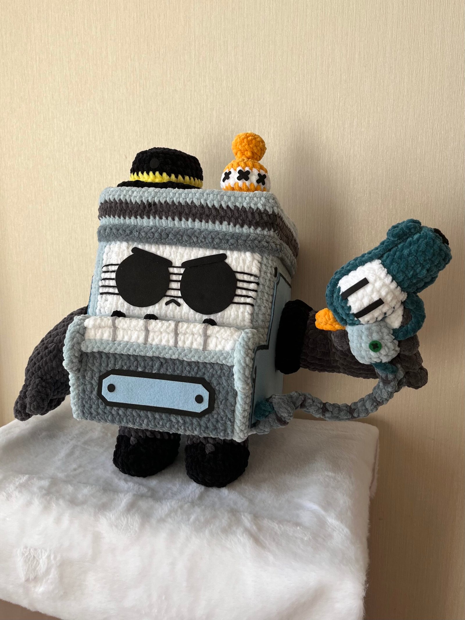 Handmade piano bot amigurumi with bird companion
