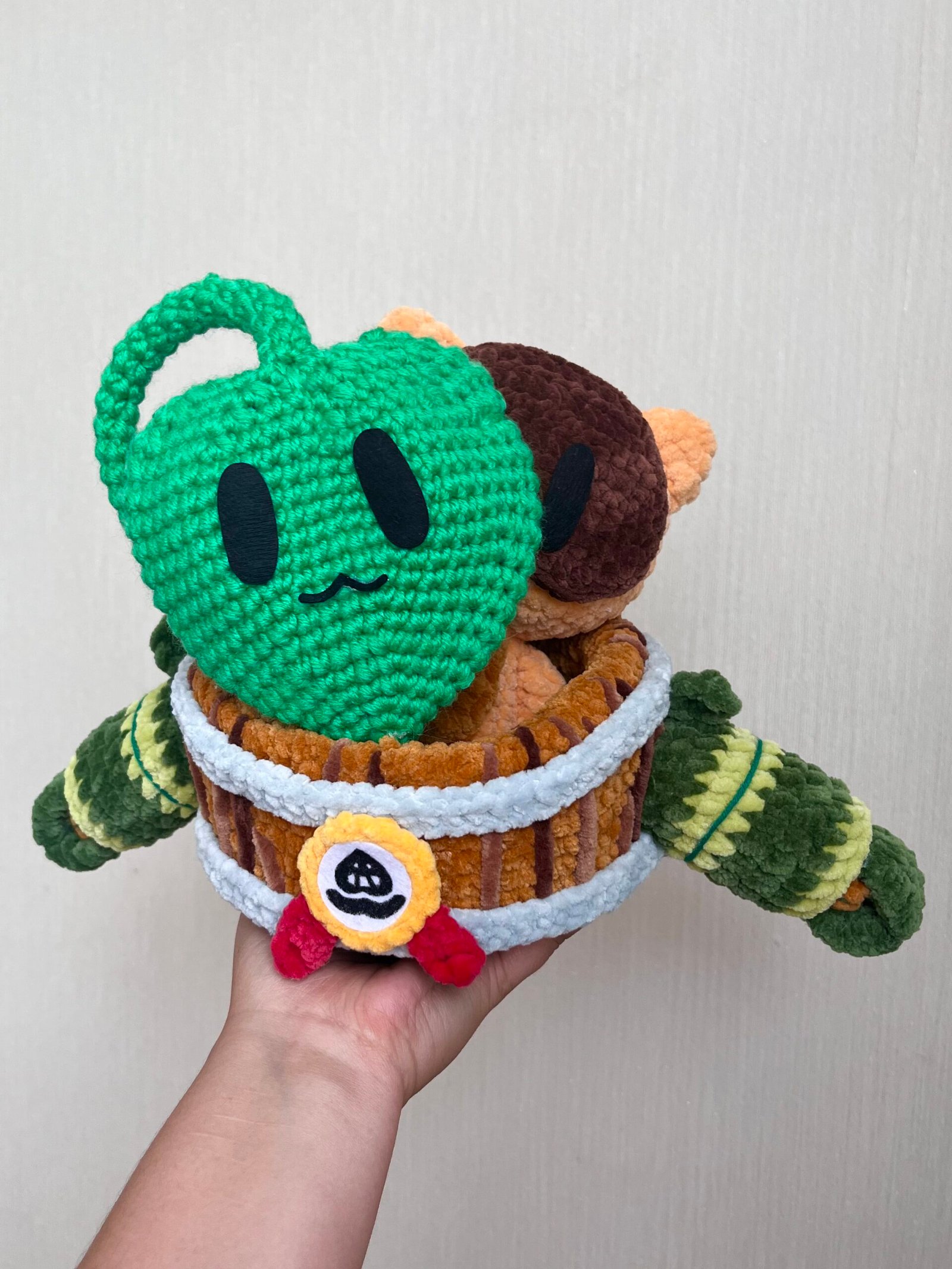 Handmade tanuki in a barrel amigurumi plushie